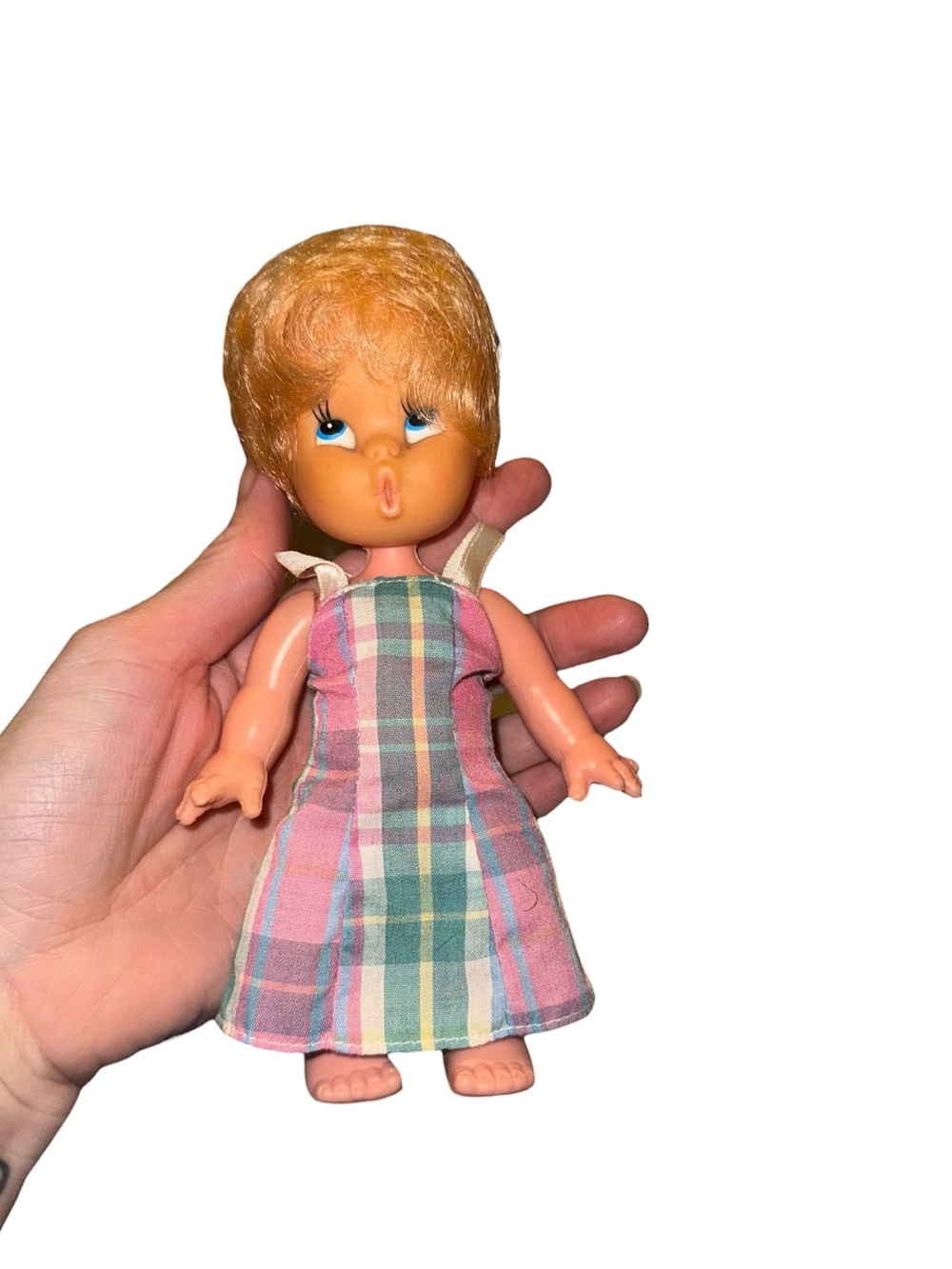 Vintage blue eyed plastic doll